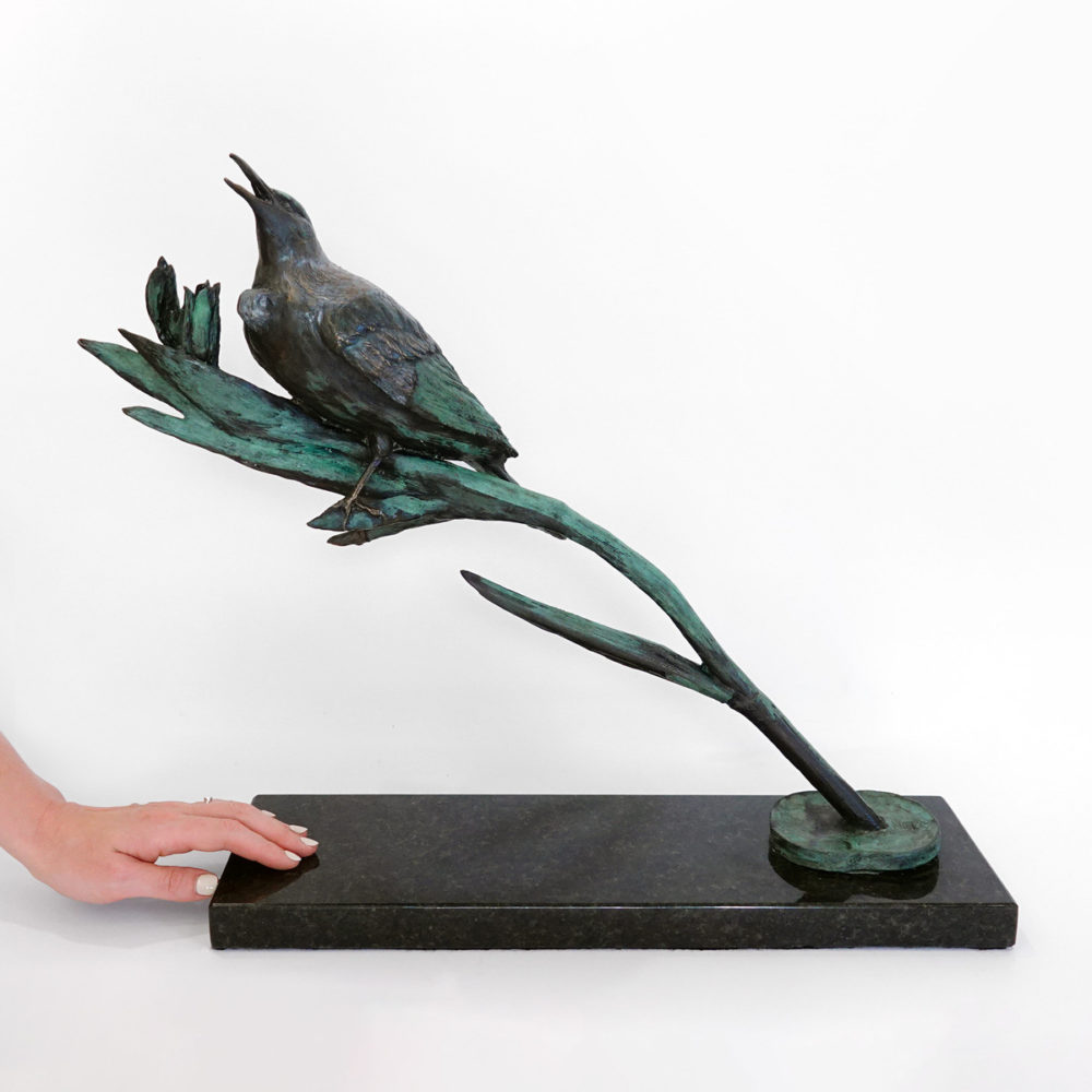 Singing Tui with Flax Flowers