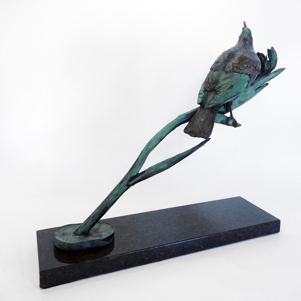 Singing Tui with Flax Flowers