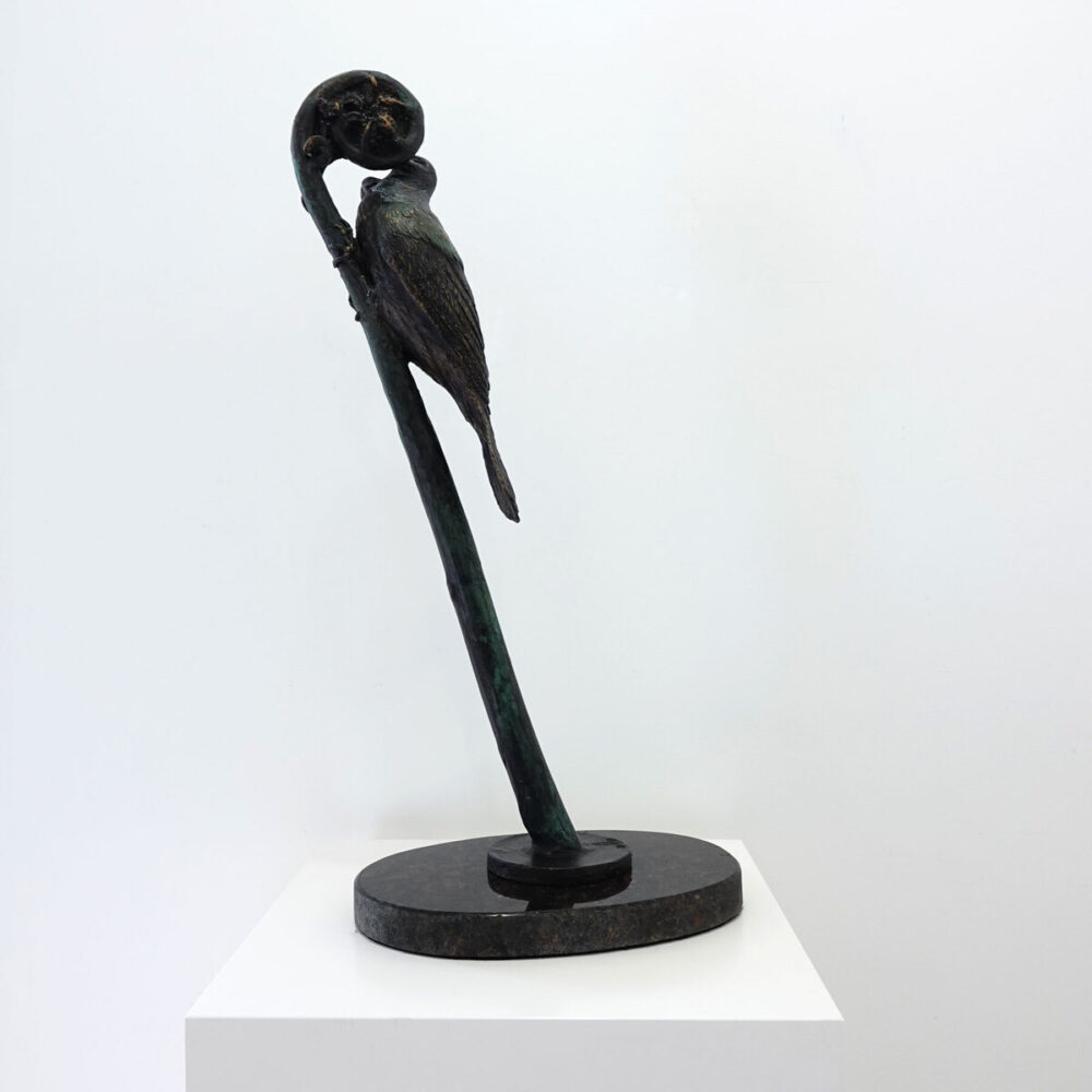 Tui on Punga Frond on Granite Base